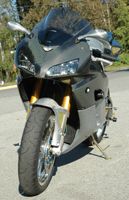 OPP Honda CBR1000RR 2004 with full Carbon/Titanium Silver bodywork plus too many modifications to mention. It's so fast, we're afraid to ride it!!!